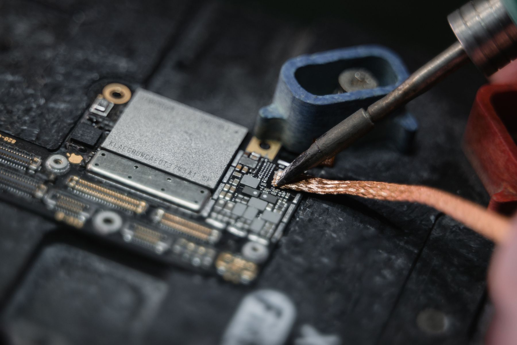 Precision soldering work on a printed circuit board